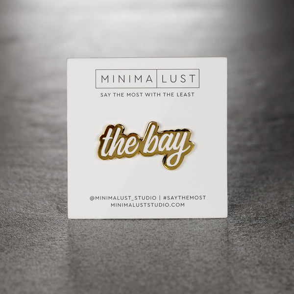 The Bay White & Gold Enamel Pin