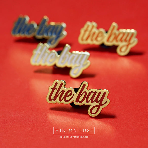 The Bay Red & Gold Enamel Pin